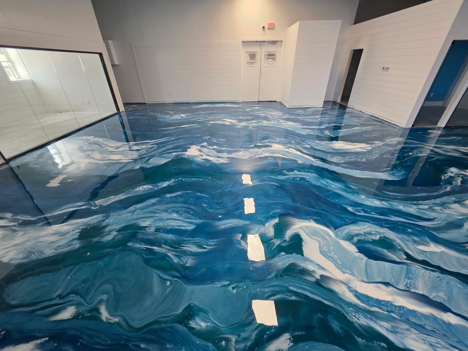 Blue ocean wave metallic epoxy floor