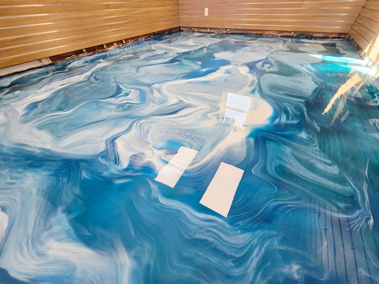 Blue and white ocean swirl metallic floor